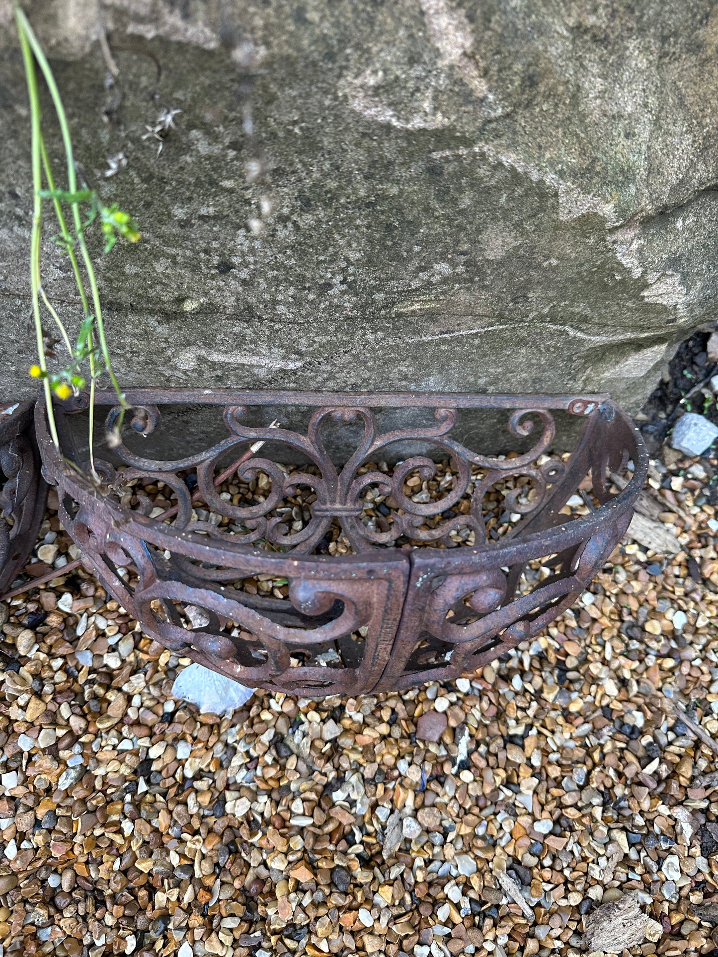 Trio of wrought iron half moon decorative vintage planters.