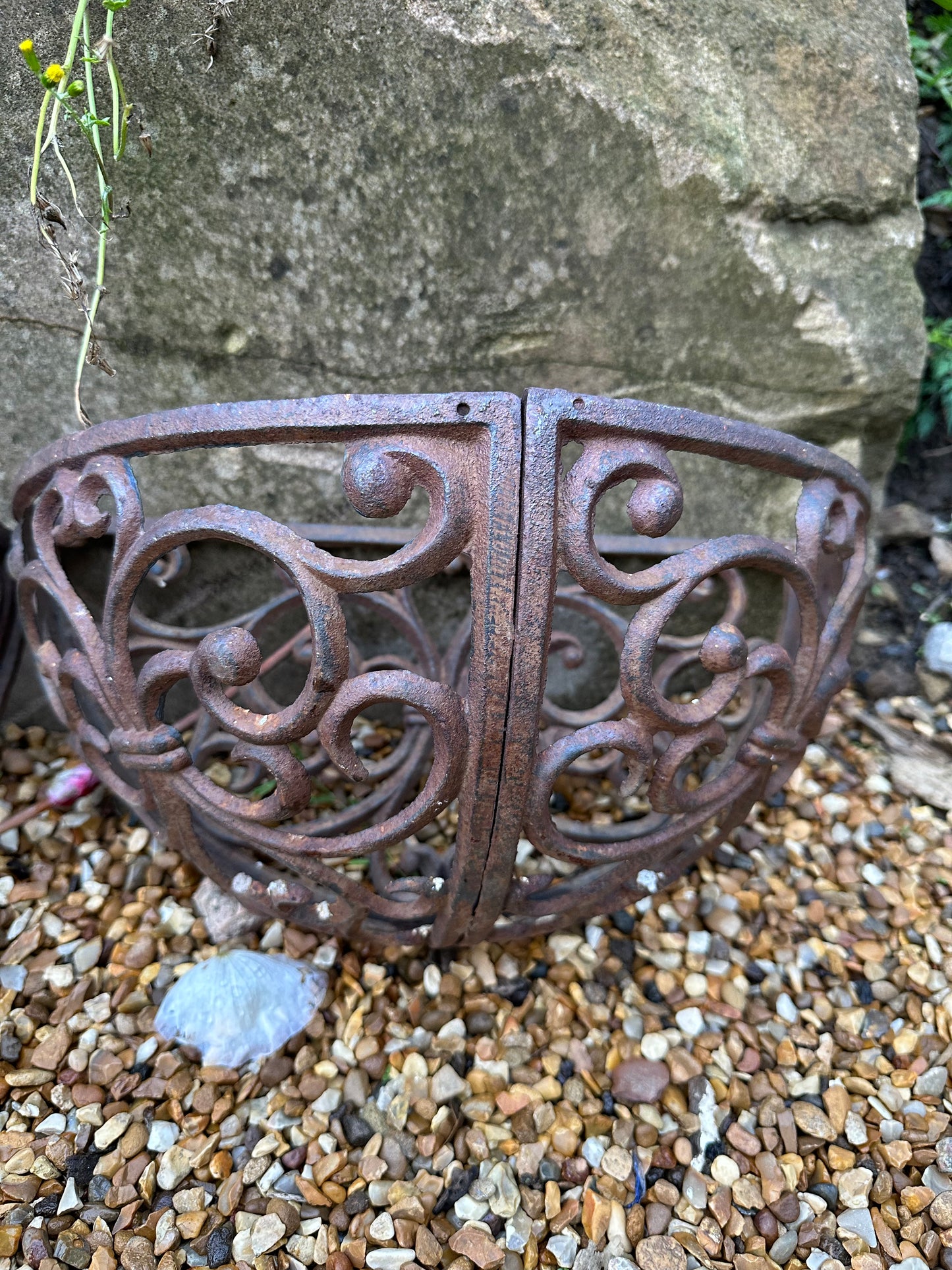 Trio of wrought iron half moon decorative vintage planters.